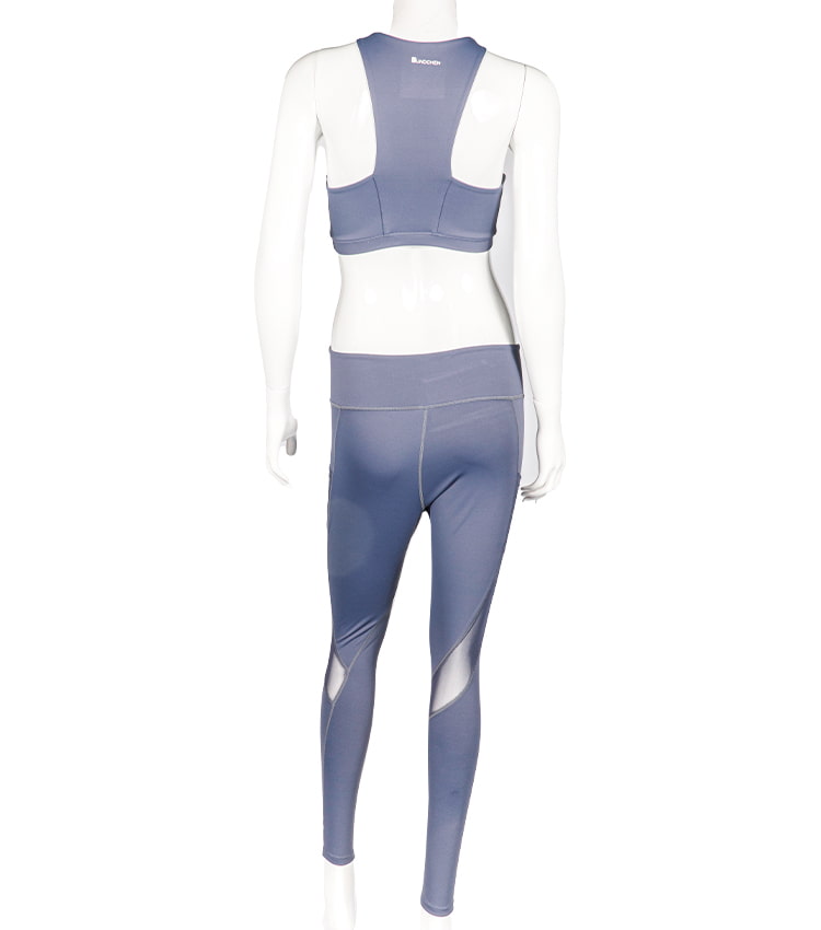 Einfarbiger zweiteiliger Sport-BH und eine Hose für Sportbekleidung.