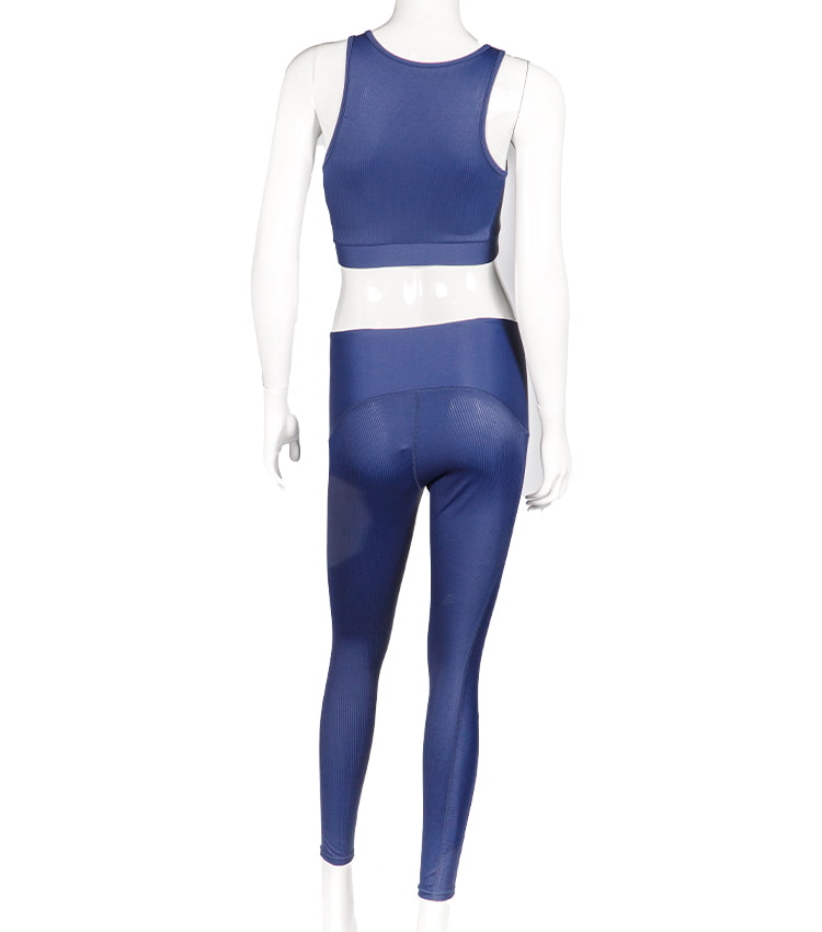 Einfarbiger zweiteiliger Sport-BH und eine Hose für das Fitnessstudio